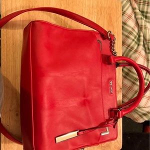Red Nine West purse.